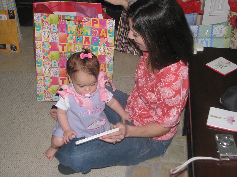 IMG_2628.JPG - Mommy reads me my birthday book.