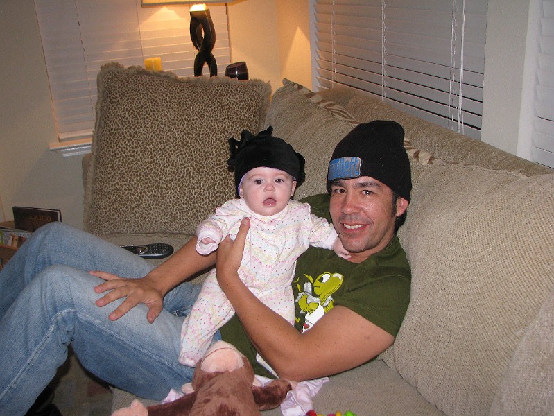 IMG_1791.JPG - Me & Daddy in our scary hats. George is passed out on the couch in front of us.