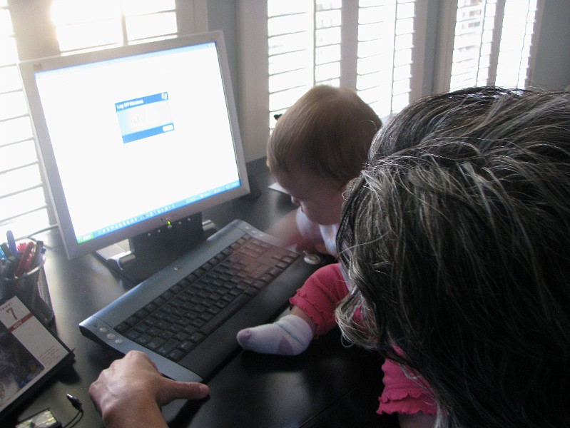 AllieTyping.jpg - I'm helping Daddy with his freelance work.