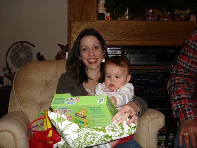ChristmasMommy.jpg - Mommy helps me open another present.