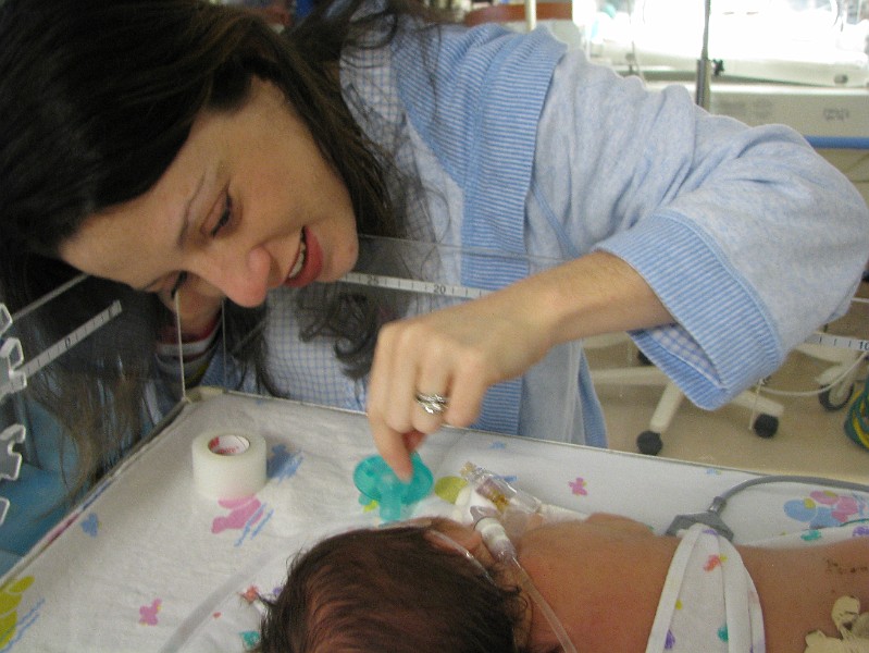 IMG_0330.JPG - Mommy tries to give me my Soothie pacifier.
