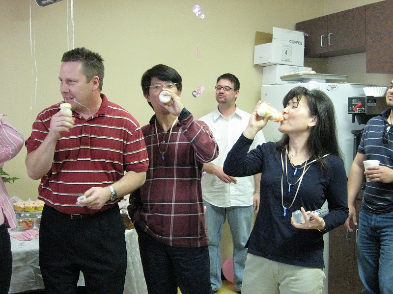 Aless.050.jpg - Chugalug chugalug. For one of the baby shower games, the Prism folks had to drink milk from a baby bottle. Whoever drank the most milk in 2 minutes won $64,000.